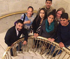 Students and staff stop to take a photo during their tour of the US Supreme Court