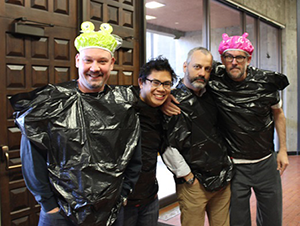 Professors Alex Ritchie, Kevin Tu, Serge Martinez and George Bach prepare for the pie throwing contest.