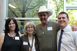 Sue George with former New Mexico State Senator Dede Feldman, teacher Nick LaRue and former law student Jonas Armstrong. 