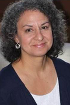 Beth Kaimowitz, an older woman with curly hair, the director of academic success