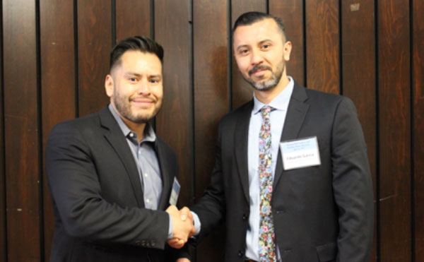 UNM Marshall-Brennan Project co-founder and former co-director, Preston Sanchez with Eduardo García, director 2018-2019