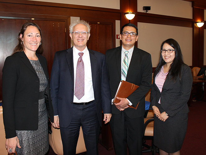 During lunch, UNM law students enjoyed mingling with judges, including Judge Robert H. Jacobvitz (second from left).