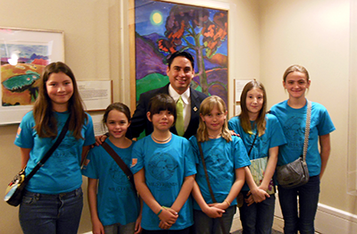 Wild Friends students from Guadalupe Montessori in Silver City, two of whom were expert witnesses on the floor of the Senate for SM 91, with sponsor Sen. Morales.