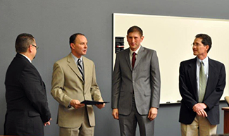 l. to r. Consul of Mexico Mauricio Ibarra, Dean Kevin Washburn, Sergio Méndez, and Daniel Ortega at the program-completion ceremony in August 2012