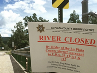 Sign of the river closing on August 8, 2015