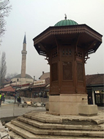Sebilj Brunnen is a wooden fountain in the middle of Old Town, Sarajevo.  A legend says that if you drink the water of the Sebilj Fountain, you will return soon. 