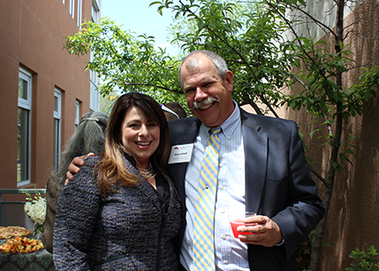 Amber Macias-Mayo (’14) and Steve Scholl (’89)