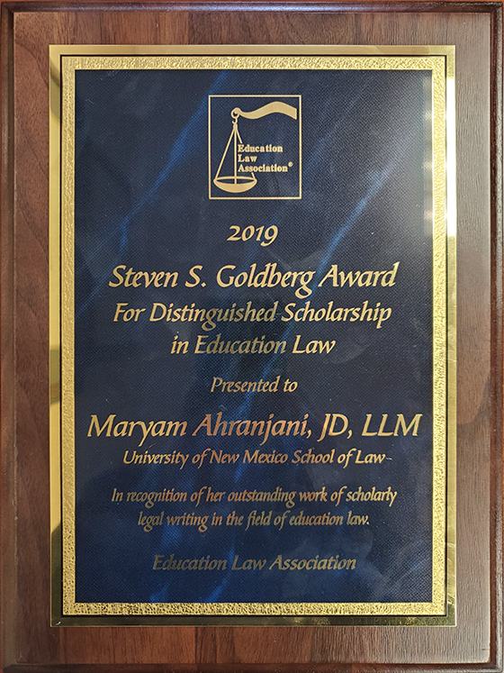plaque that was awarded to Maryam Ahranjani