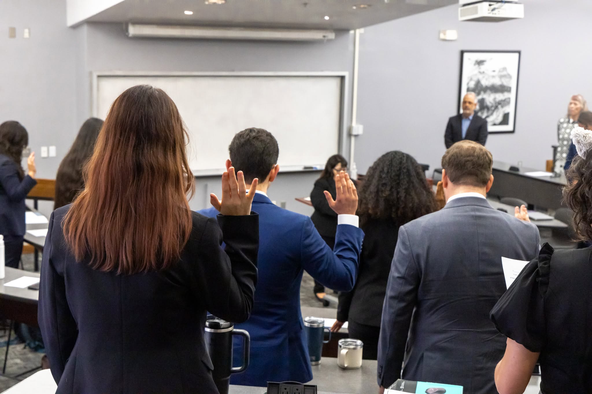 group of people being sworn in